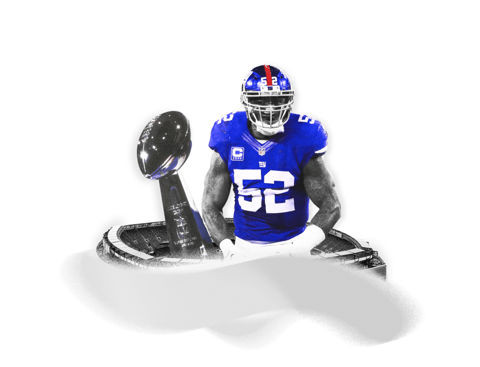 Jonathan Casillas in New York Giants uniform with trophy